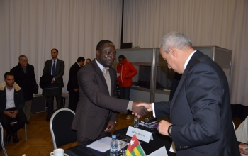 Monsieur Abassah Kokouvi Abayili, Assistant Economique, Gestionnaire du Site web et Chargé de Communication de l'Ambassade du Togo salué par Docteur El Hassane HZAINE , Directeur Général du CIDC