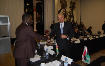 Monsieur Abassah Kokouvi Abayili, Assistant Economique, Gestionnaire du Site web et Chargé de Communication de l'Ambassade du Togo salué par Docteur El Hassane HZAINE , Directeur Général du CIDC